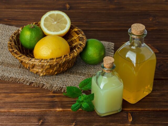 some-lemon-juice-with-half-lemon-piece-sack-basket-wooden-surface-high-angle-view-space-text_176474-14175 some-lemon-juice-with-half-lemon-piece-sack-basket-wooden-surface-high-angle-view-space-text_176474-14175